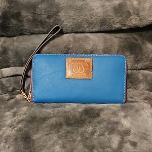 Dooney & Bourke Blue Clutch with Brown Leather Patch